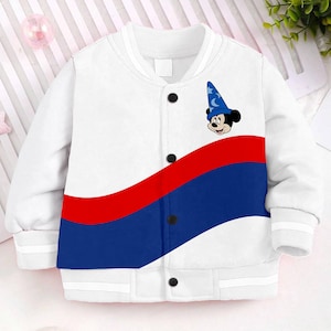 May include: White bomber jacket with a red and blue wave design. The jacket features a Mickey Mouse character wearing a wizard hat.