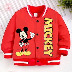 May include: Red and white baseball jacket with a Mickey Mouse graphic and the word "MICKEY" printed on the front.