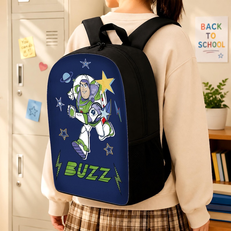 May include: A black backpack featuring a dark blue front panel with a graphic of Buzz Lightyear in a running pose. The design includes yellow stars, blue lightning bolts, and a planet, with the text BUZZ printed in large green block letters.