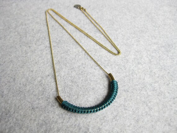 V A R O A . Brass Tube Pendant on Long Chain with Macrame Fiber Detail . Modern Minimalist Textile Jewelry . © Design par .. raïz ..