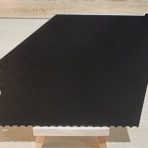 Black and White brick ruler showing the back view.