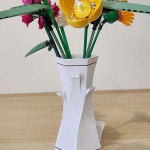 White Marble and black LEGO-Compatible Vase filled with LEGO botanical flowers