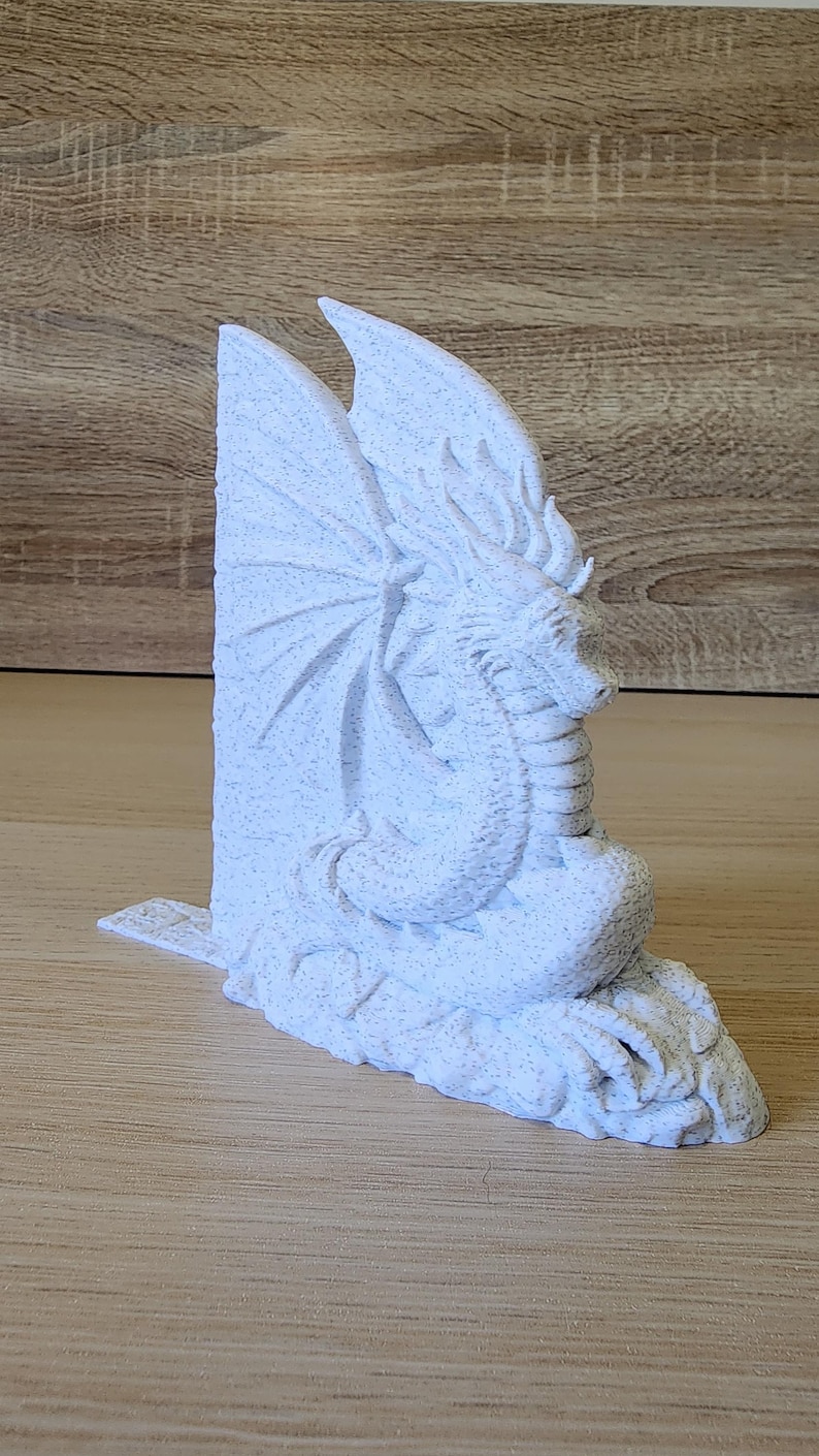 White Majestic Dragon Bookend angled to show detail on wings and base