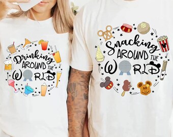 May include: White t-shirts with circular graphics. One shirt says "Drinking Around the World" with drink illustrations. The other says "Snacking Around the World" with food illustrations. Both shirts feature the Epcot globe.