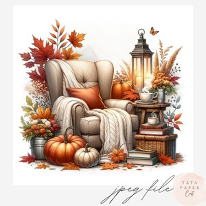 May include: An illustration of a cozy autumn scene. A cream-colored armchair is draped with a white knitted blanket and an orange pillow. Pumpkins, fall leaves, and a lantern with a lit candle complete the warm, inviting setting.