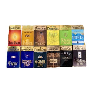 May include: A collection of 14 paperback books by Danielle Steel. The books are arranged in two rows of seven. The titles of the books are: Lone Eagle, The Promise, The Kiss, Malice, Now and Forever, Miracle, Daddy, Irresistible Forces, No Greater Love, The Cottage, The Klone and I, and The Long Road Home.