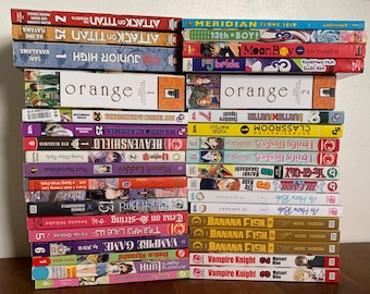 May include: A stack of 25 manga graphic novels, including titles like "Attack on Titan", "Orange", "Vampire Knight", "Banana Fish", and "Fruits Basket".