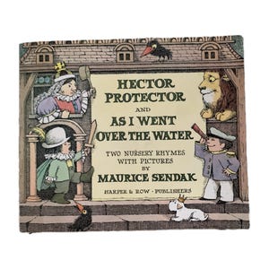May include: A vintage children's book titled "Hector Protector and As I Went Over the Water" by Maurice Sendak. The cover features illustrations of characters, including a lion, a boy with a telescope, and a crow. Published by Harper & Row.
