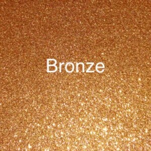 May include: A close-up of a bronze glitter background with the word "Bronze" in white text.