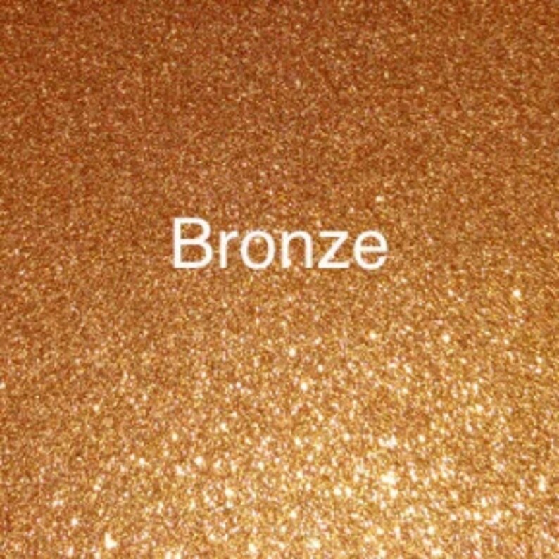 May include: A close-up of a bronze glitter background with the word "Bronze" in white text.