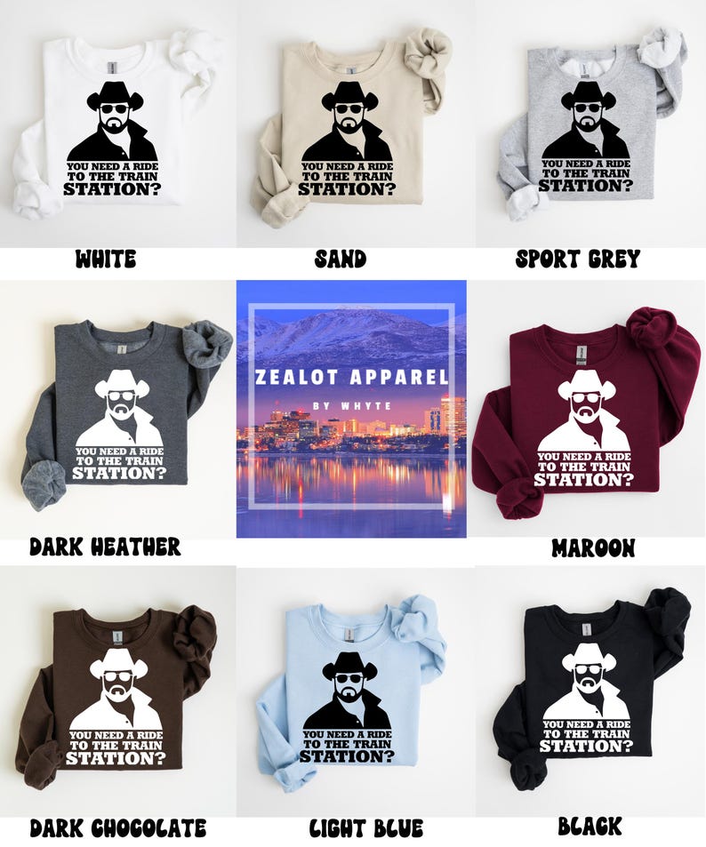 K&ouml;nnte beinhalten: Eine Auswahl an lang&auml;rmeligen Sweatshirts in verschiedenen Farben, darunter Wei&szlig;, Sand, Sportgrau, Dunkelgrau, Bordeaux, Dunkelschokolade, Hellblau und Schwarz. Jedes Sweatshirt zeigt eine Grafik eines Mannes mit Cowboyhut und dem Text "YOU NEED A RIDE TO THE TRAIN STATION?"