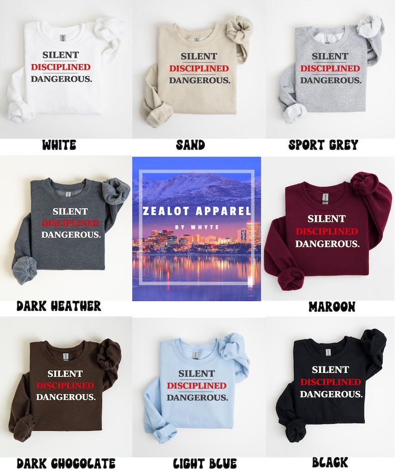 May include: A collection of long-sleeved sweatshirts in various colors, including white, sand, sport grey, dark heather, maroon, dark chocolate, light blue, and black. Each sweatshirt features the text "SILENT DISCIPLINED DANGEROUS."