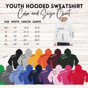May include: A chart for youth hooded sweatshirts, displaying size, width, length, and sleeve measurements in inches. The chart includes a color palette with options like white, black, and red. A diagram illustrates how to measure the sweatshirt.