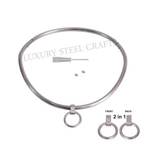 May include: A silver-colored metal collar with a circular design, featuring a ring attachment and a small screwdriver. The text "LUXURY STEEL CRAFTS" is visible. Includes two additional ring attachments labeled "FRONT" and "BACK" with "2 in 1" text.
