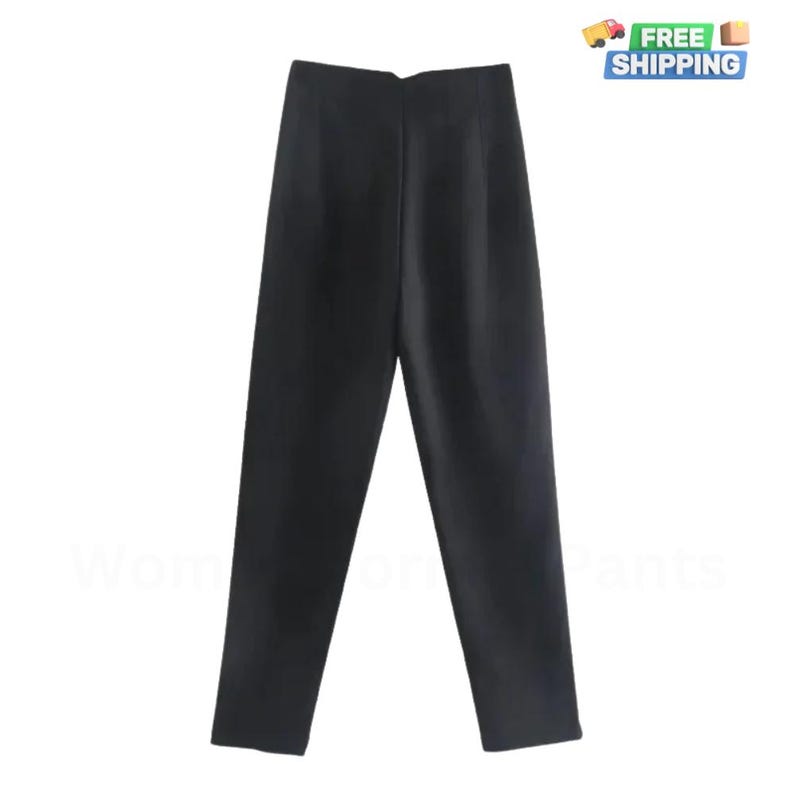 May include: Black high-waisted pants with a straight leg fit.