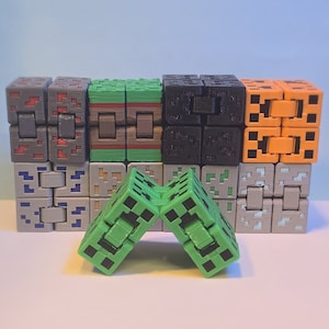 Fidget Cube | Grass Block | Creeper | Obsidian Block | Ore Blocks
