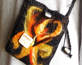 May include: A black crocheted bag with a colorful flower design and a silver clasp. The bag has a black strap and a black tassel.