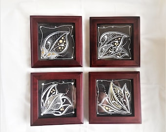 Set of 4 coasters in cherry color wooden frame with glass and hand-drawn original design