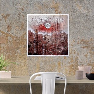 May include: Abstract art print with a red, white, and black color scheme. The print features a circular shape in the center and a textured background.
