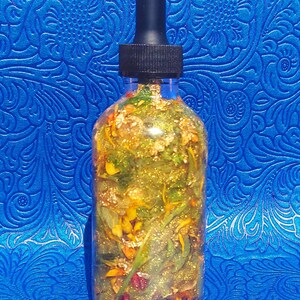 Money Ritual Oil, spell Prosperity Conjure Oil with Herbs, Gems, Gold Leaf 4oz Bottle Wealth Attraction Hoodoo Oil handmade money drawing ritual oil, afro atlantic prosperity conjure blend, wealth attraction feng shui rootwork oil, handcrafted spell oil with herbs and stones, 24k gold leaf magical abundance oil, magick intention oil for money success financial Collar de Odi bara Odu Obara Di Black and Red seed necklace odibara oddi obaradi eleke dilogun kacha osun odu ifa Elegua iwere iyeye