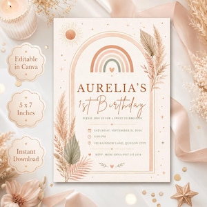 Könnte beinhalten: Eine rechteckige Geburtstagseinladungskarte mit einem zentralen Bogen, einem Regenbogen und Illustrationen von getrocknetem Pampasgras. Der Text lautet: Aurelia's 1st Birthday, Please join us for a sweet celebration, Saturday, September 21, 2026, 3:00 PM, 123 Rainbow Lane, Quezon City, RSVP: Mom Anna 0917 555 1234.