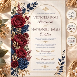 May include: A 5x7 inches wedding invitation card featuring a cream background with an arched gold border. The left side is decorated with deep red roses, dark blue hydrangeas, and gold foliage. The text includes the names Victoria Rose Bennett and Nathaniel James Carter, along with ceremony and reception details.