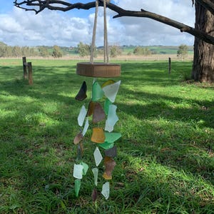 Wind chimes or Suncatcher. Repurposed glass. Recycled timber.