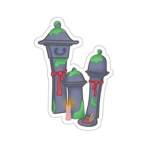 Könnte beinhalten: Ein Aufkleber mit drei stilisierten, dunkelblauen Laternen mit grünen Akzenten und roten Bändern. Eine kleine rosa Kerze mit einer brennenden Flamme befindet sich vor den Laternen. Das Design hat einen skurrilen, cartoonartigen Stil.