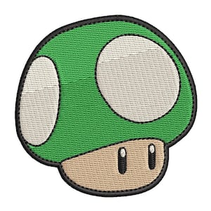 Könnte beinhalten: Grün-weißer gestickter Pilz-Patch mit schwarzem Umriss.