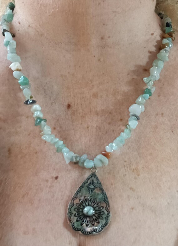Hammered silver pendant, Southwestern theme necklace, teardrop pendant, turquoise stone necklace, green stone chips, nylon stretch cord.