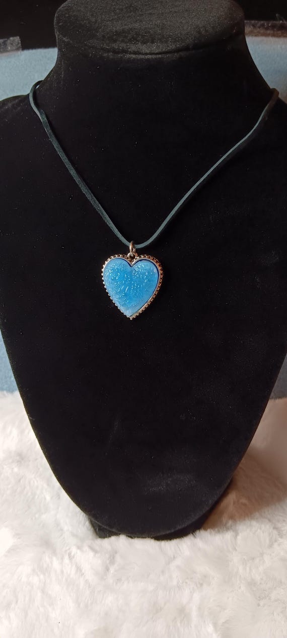 Blue epoxy resin heart pendant, pendant with flowers, black suede cord.