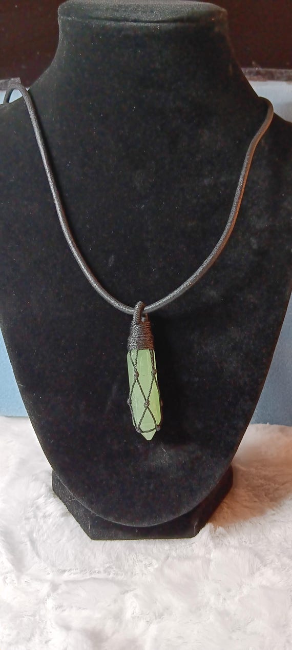 amulet necklace, sea green crystal, sea green amulet, thread wrapped crystal, leather cord necklace, black leather cord necklace.