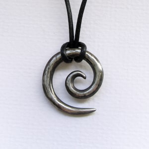 Koru Tribal spiral Pendant in aged silver