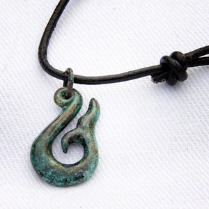 Whale Tail Hook in stormy skies
