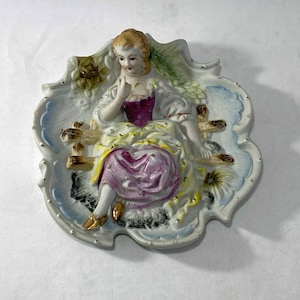 Porcelain Lady in Long Gown Sitting on Wooden Bench Japanese Decorative Hanging Plate post WWII Chase Hand Painted 5 3/4&quot;