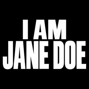 May include: A graphic design featuring the bold white text I AM JANE DOE centered against a solid black background. The lettering is presented in a clean, sans-serif, uppercase font that stands out clearly against the dark, high-contrast backdrop.