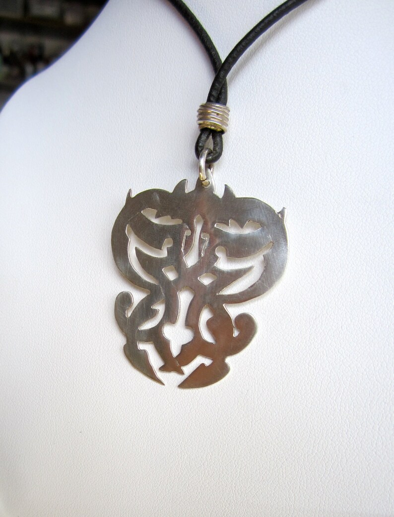 Hand Cut Silver Fretwork and leather Necklace image 1