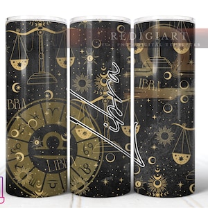 May include: Three black and gold tumbler designs with a zodiac theme. The tumblers feature a Libra zodiac symbol, stars, and celestial elements. The text "Libra" is written on each tumbler.