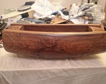 A carved wooden Potlatch bowl, likely from the Northwest Coast. 17.5 X 5.5 In.