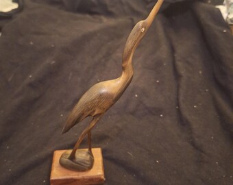 Carved horn Stork, Heron, 8" high, Shades of brown, nicely carved