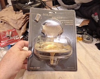 Soporte de pared para cepillo de dientes de latón macizo vintage con forma de concha, sin usar, estilo náutico playero, nuevo en caja.