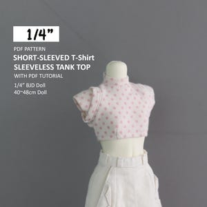 May include: A pink and white polka dot short-sleeved t-shirt and sleeveless tank top pattern for a 1/4" BJD doll (40-48cm). The pattern includes a PDF tutorial.