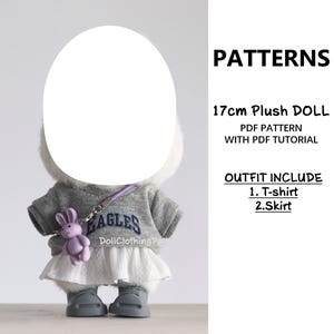 May include: A 17cm plush doll wearing a grey short-sleeved t-shirt with the text EAGLES, a white skirt, and grey shoes. A small purple rabbit charm hangs from a purple cord around the neck. Text reads PATTERNS, 17cm Plush DOLL, PDF PATTERN WITH PDF TUTORIAL, OUTFIT INCLUDE 1. T-shirt 2.Skirt.