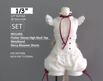 May include: A doll outfit set in white, featuring a flutter sleeve high neck top, waistband, and Darcy bloomer shorts. The outfit includes a PDF pattern with a tutorial. The set is designed for a 1/3" BJD doll, approximately 23-25 inches tall.