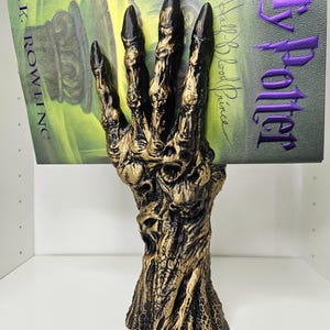Skeleton Hand Book Display: Gothic Library Decor