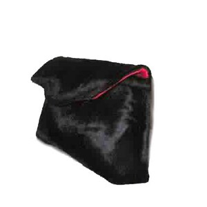 May include: Black faux fur clutch with a red satin lining. The clutch has a fold-over flap closure.