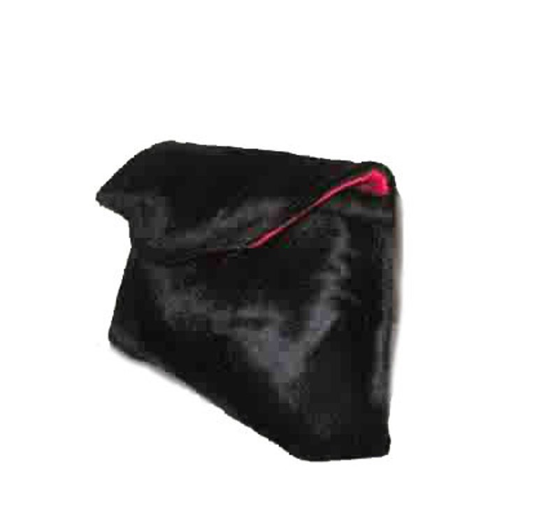 May include: Black faux fur clutch with a red satin lining. The clutch has a fold-over flap closure.
