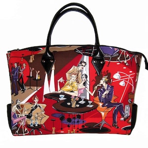 May include: A red tote bag with a black leather handle and a colorful illustration of people in a bar setting. The illustration features a red, brown, and white color scheme with black outlines.