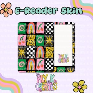 May include: An e-reader skin featuring a grid pattern of colorful squares with icons including peace signs, rainbows, cherries, suns, and black and white checkerboards. The text Aly K Creates is printed in a stylized font on the white screen area.