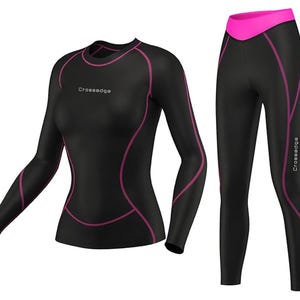 May include: Black long-sleeve shirt with pink trim and the word "CrossEdge" on the front. Black leggings with pink trim and the word "CrossEdge" on the side.